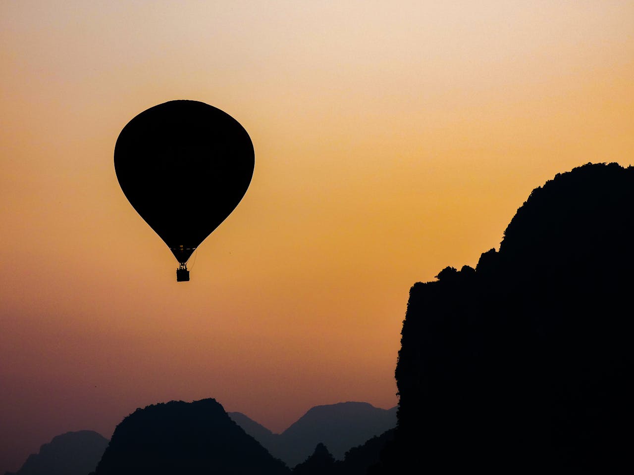 Begin your travel day with Vang Vieng’s serene ambiance